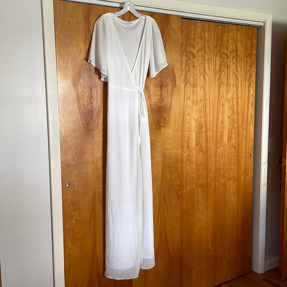Long, cream/off-white wrap style dress